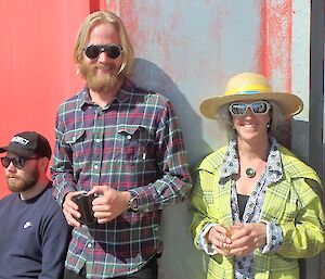 Expeditioners watch the Australia Day cricket match