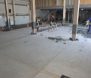 One week later, the concrete pour is complete and the floor is done