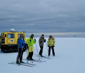 Four skiers before commencing their ski trip