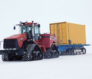 A tractor pulls the Wilkins fuel tank