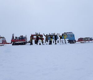 The traverse team in front of the Hägglunds