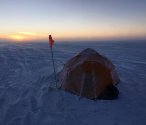 A sunrise over the camp