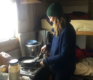 Jordan cooks pancakes at Jacks Hut