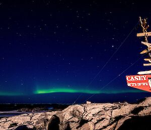 Aurora low on the horizon behind the Casey sign