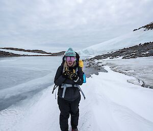 Elise beside a frozen lake on the Browning Peninsula