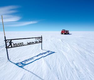 Wilkins sign with search and rescue Hägg in the background