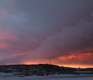 Sunset and clouds over the anemometer mast