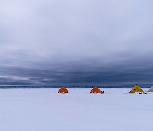 Three tents on the snow