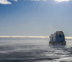 Hägglunds driving across the ice