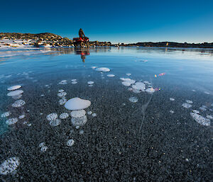 Bubbles in ice on frozen lake