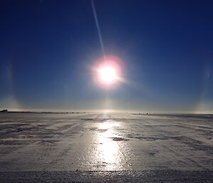 Ring around sun over the runway