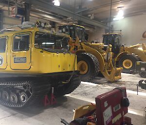 Bays in workshop full of plant and equipment