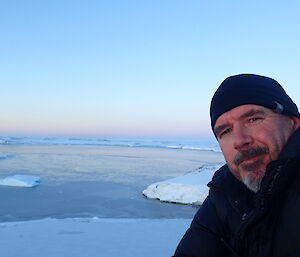 Andrew and the sea ice in the background