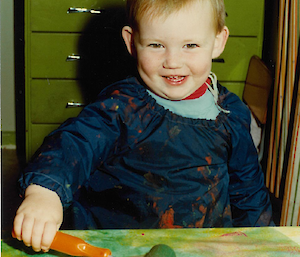 Child smiling at camera