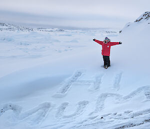 “Hi Mum” Message in snow and expeditioner