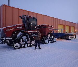 Exopeditioner with sign in front of tractor