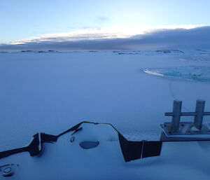 The sea ice begins to return at wharf