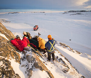 Team of expeditioners on a hillside