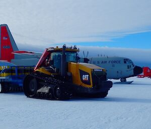 Tractor and sled and aircraft