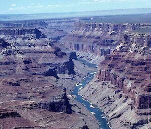 Photo of a canyon with a river in the bottom