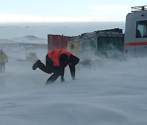 Expeditioner falling over in snow