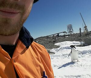 Zac with penguin in the background