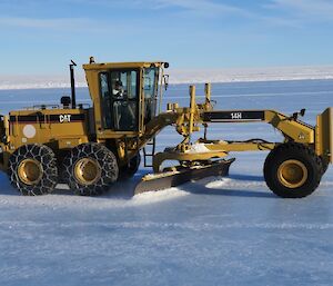 A grader on the ice runway