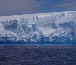 A very big iceberg surrounded by water