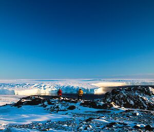 Two expeditioners in front of the Vanderford Glacier