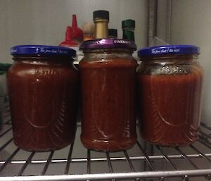 Jars of chilli jam in the fridge.