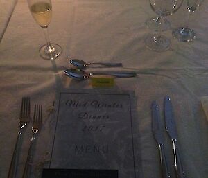 A formal place setting on the table.