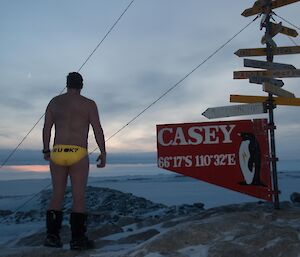 Simo on speedos at Casey sign