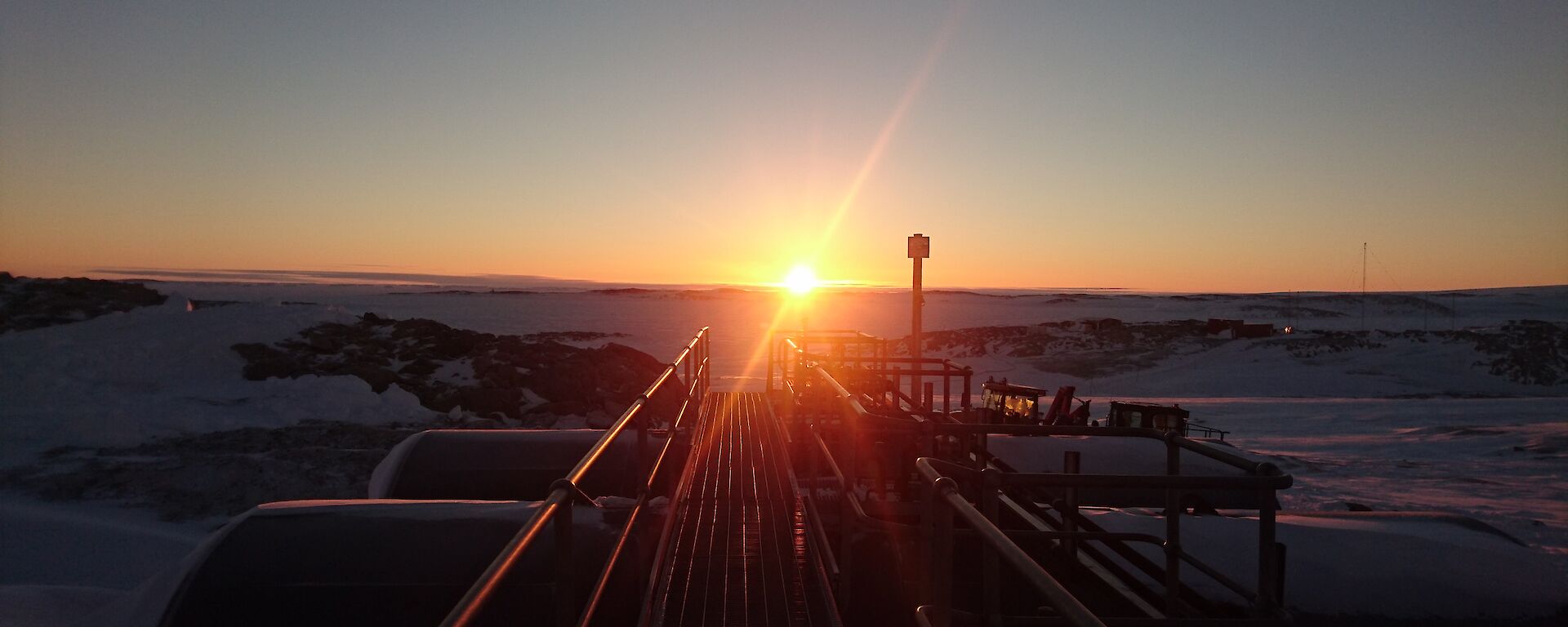 Sunrise over fuel tanks