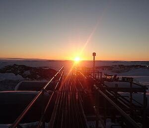 Sunrise over fuel tanks