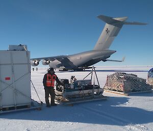 Cargo waiting to be loaded aboard aircraft.