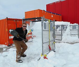 Matty digging out gas pallets from the ice and snow.