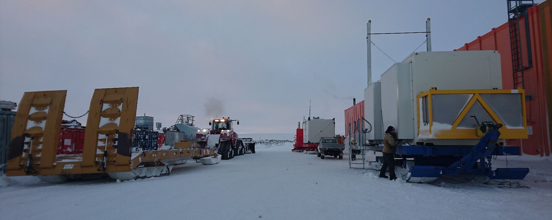 Vehicles parked outside the workshop.