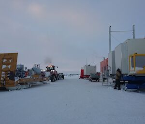 Vehicles parked outside the workshop.