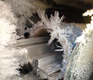 Ice crystals in a pipe storage container.