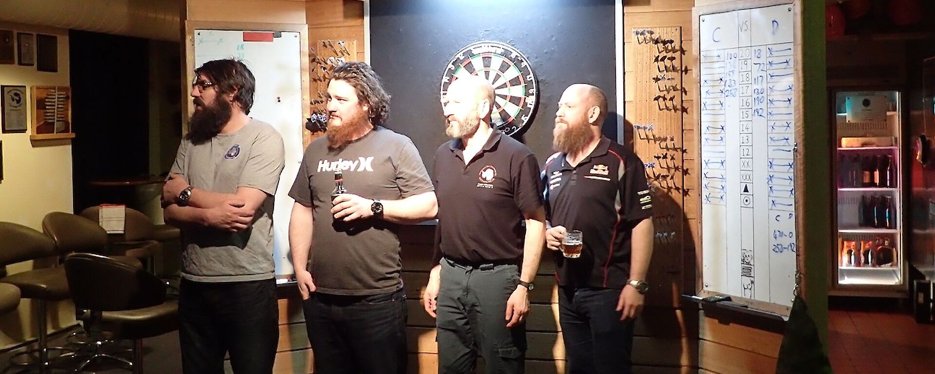 Scottish, Jimbo, Mark and Sealy at darts board