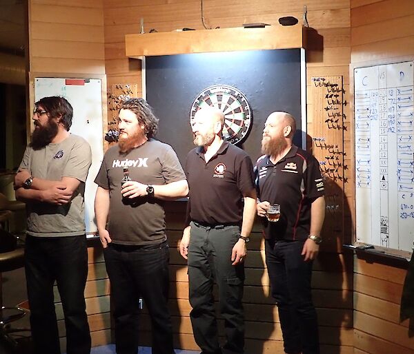 Scottish, Jimbo, Mark and Sealy at darts board