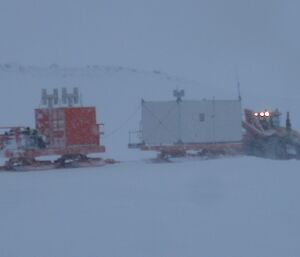 Vehicles heading off in snowy conditions