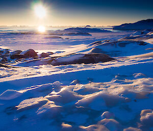 Snow and sea ice with low sun.