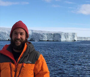 Expeditioner Ducky in front of Vanderford Glacier.