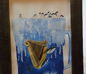 Painting of penguins in a Guinness glass.