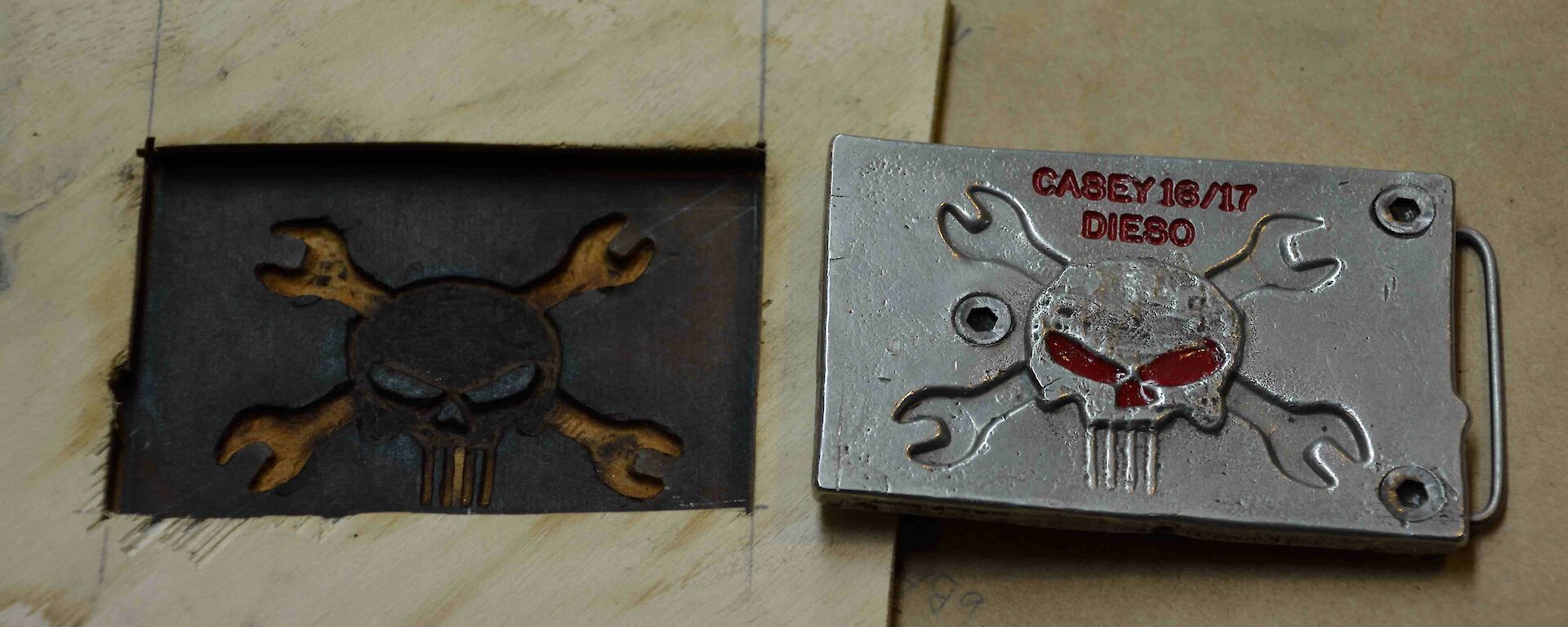 A hand made metal belt buckle.