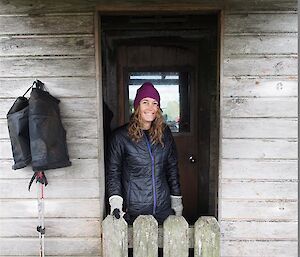 Jacque standing in doorway of Green Gorge Hut