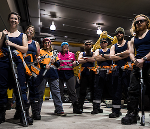 The casey ladies dressed as mechanics and the real mechanics face off with dozer behind