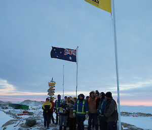 &#149;	Casey team stand at foot of flag poles, one flying the Australian Flag and one flying the Invictus Games Flag