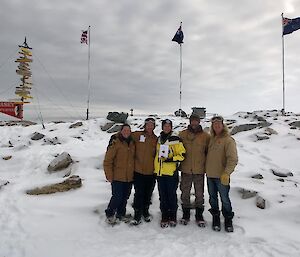 Casey’s Remembrance Day organisers join the SL in front of the flag poles (Lauren Bishop, Garvan Timms, Craig Butsch, Ben McCormick, joined by Chris MacMillian (SL))